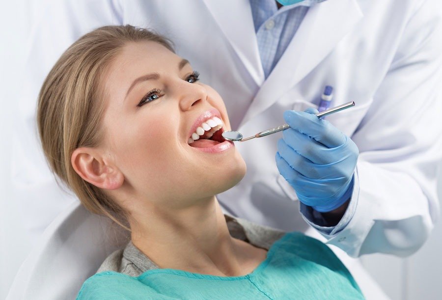 dentist explaining treatment plan to patient in A Narayanapura Bangalore